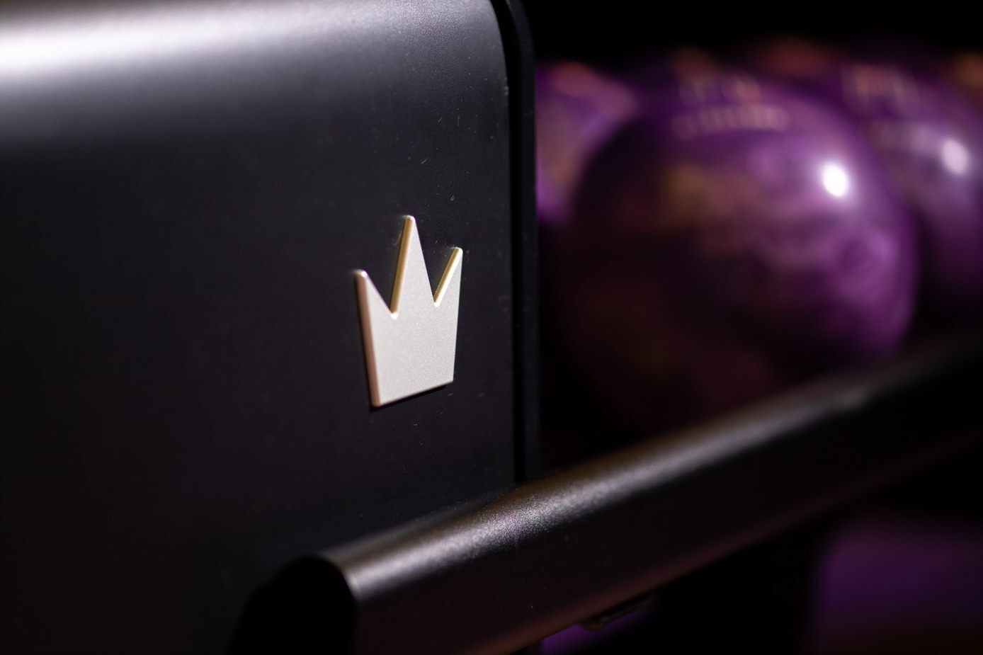 Brunswick crown emblem on a ball return — Valcke Bowling